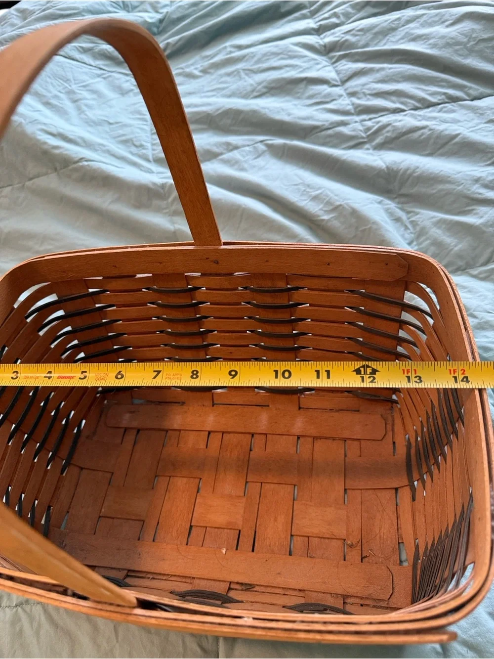 Longaberger Two-Tone Woven Basket in Brown and dark green.